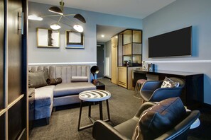 55-inch flat-screen TV with cable channels, TV - The Rose Chicago, Tapestry Collection by Hilton (Rosemont)