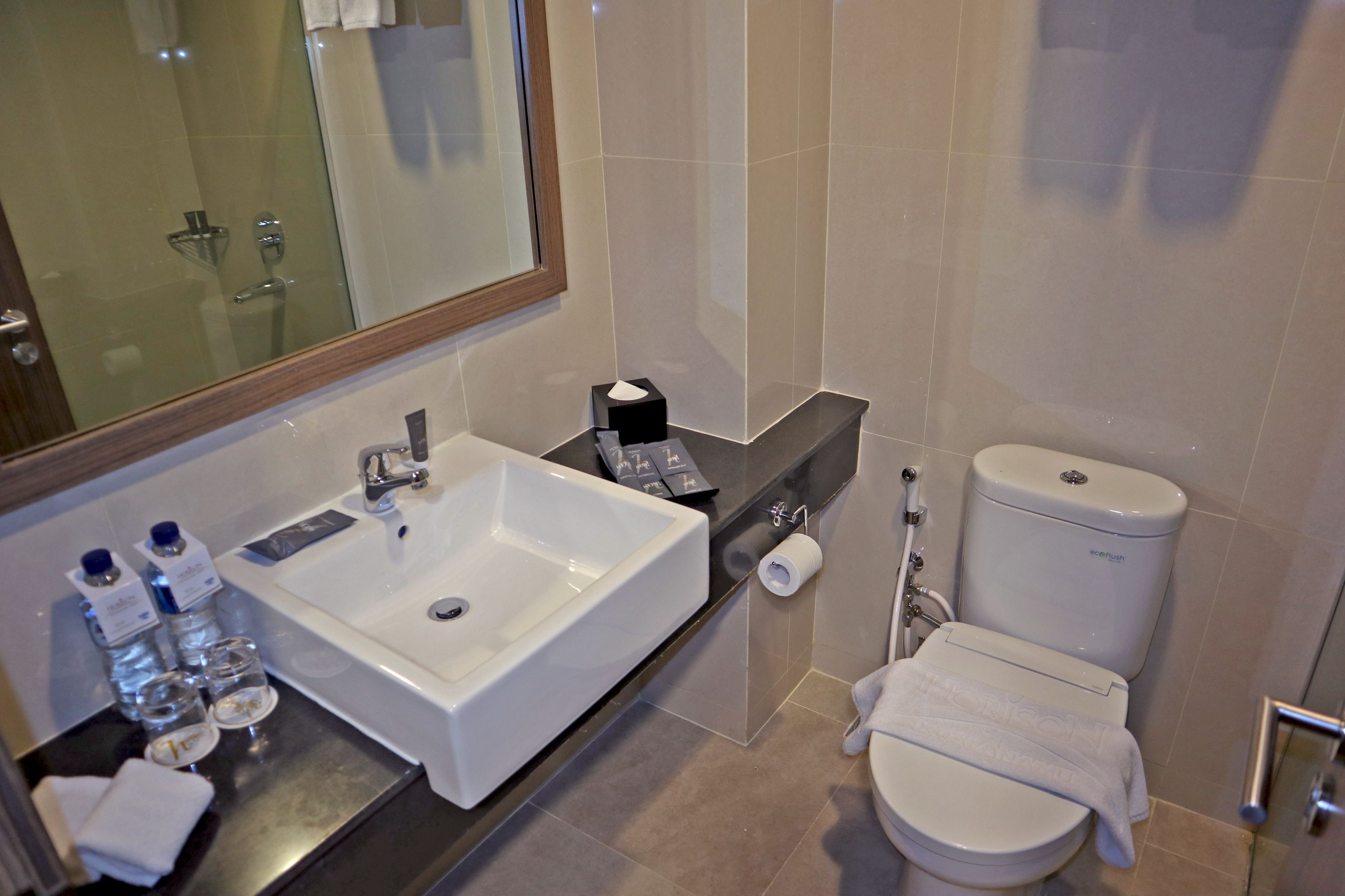 shower, free toiletries, slippers, towels