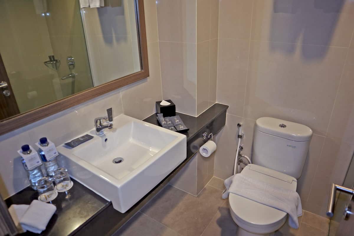 shower, free toiletries, slippers, towels