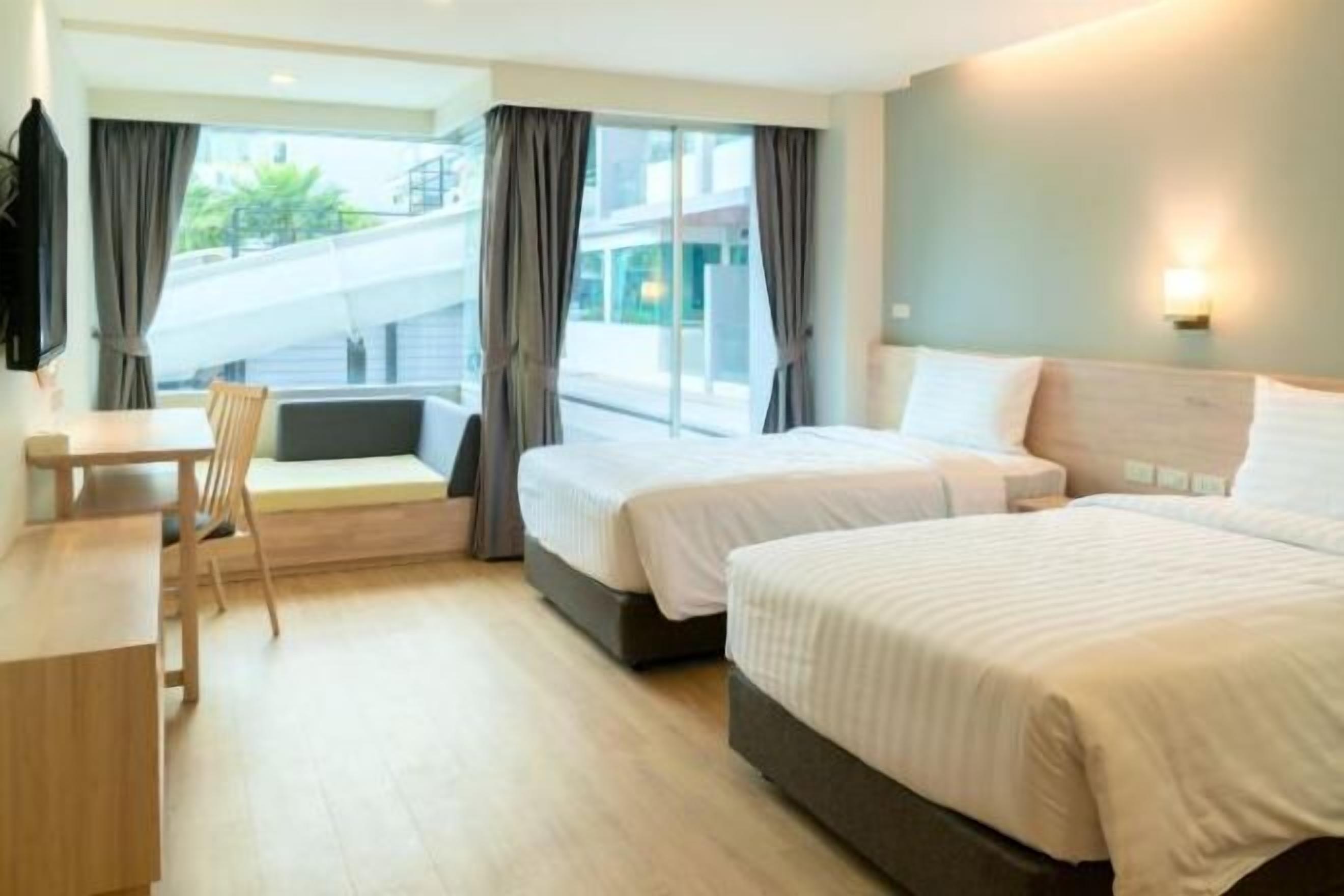 Roba de llit d'alta qualitat, minibar i caixa forta a l'habitació 