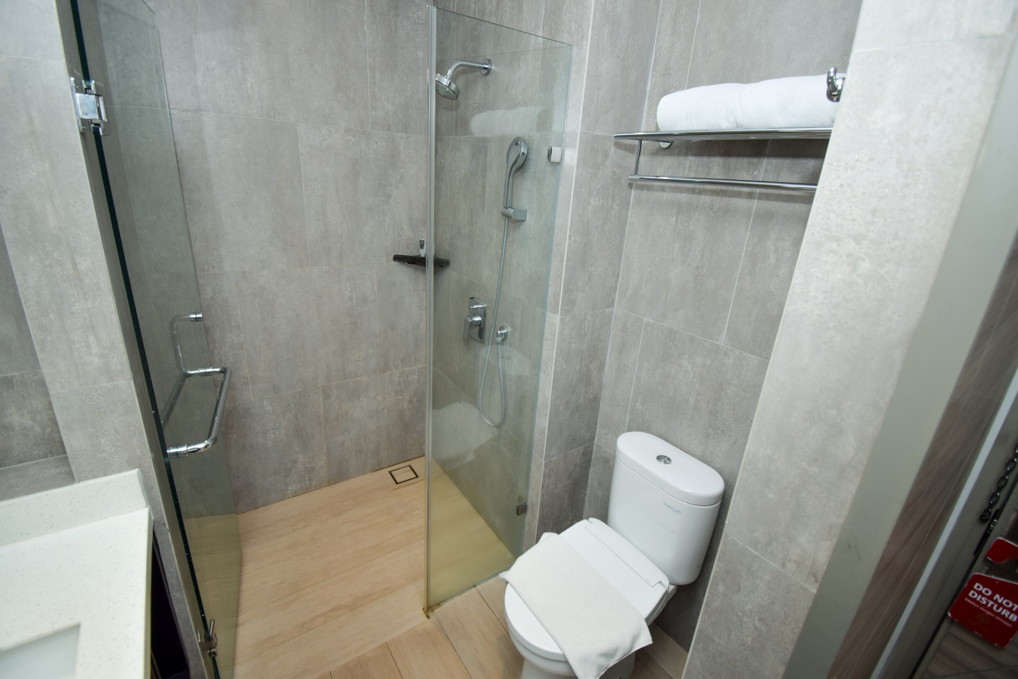 shower, free toiletries, slippers, towels