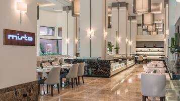 Breakfast, lunch, dinner served; local and international cuisine