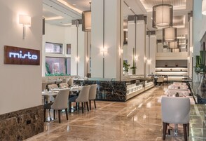 Breakfast, lunch, dinner served; local and international cuisine 