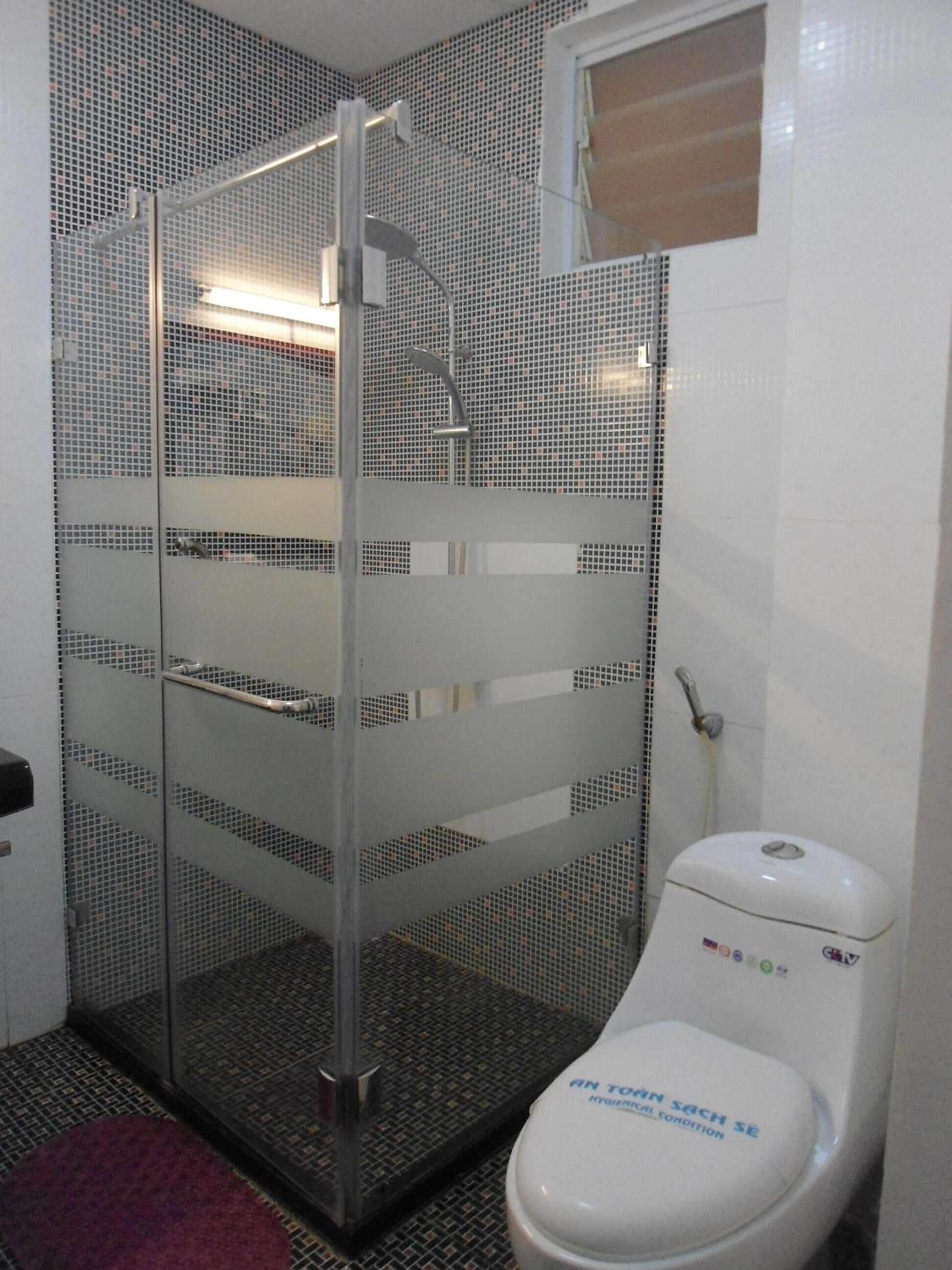Shower, free toiletries, hair dryer, slippers