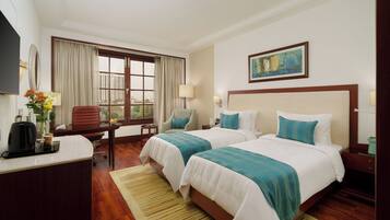 Superior Twin Room | Minibar, in-room safe, desk, laptop workspace