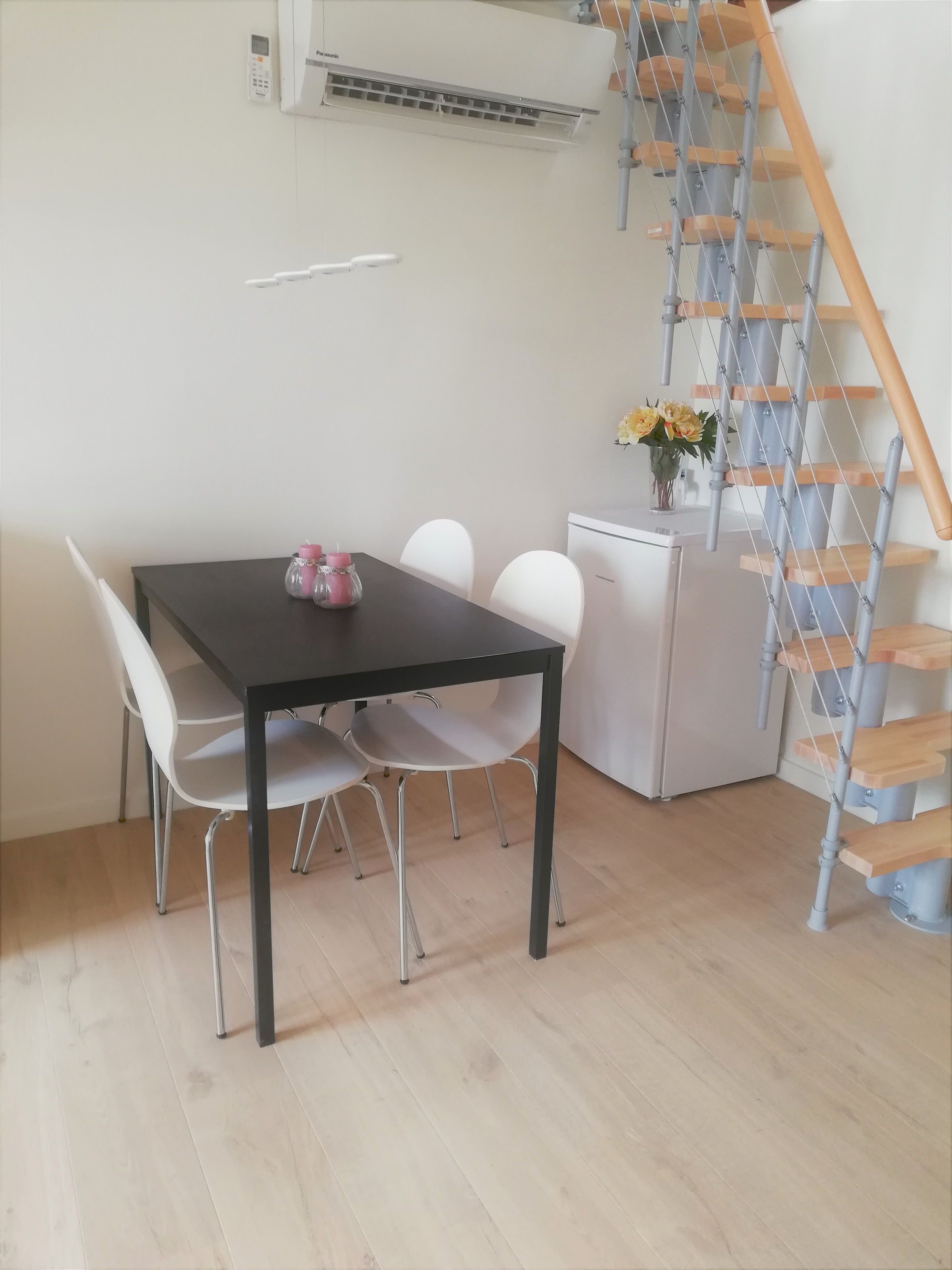 basic apartment, multiple beds | in-room dining