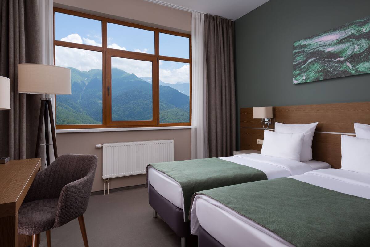 Grand Twin Room, Balcony, Mountain View | In-room safe, desk, iron/ironing board, free WiFi