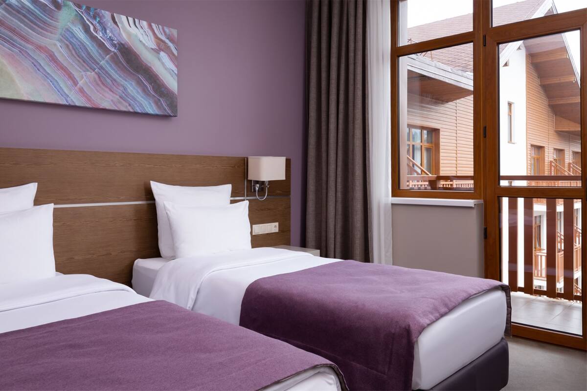 Superior Twin Room, Balcony, City View | In-room safe, desk, iron/ironing board, free WiFi