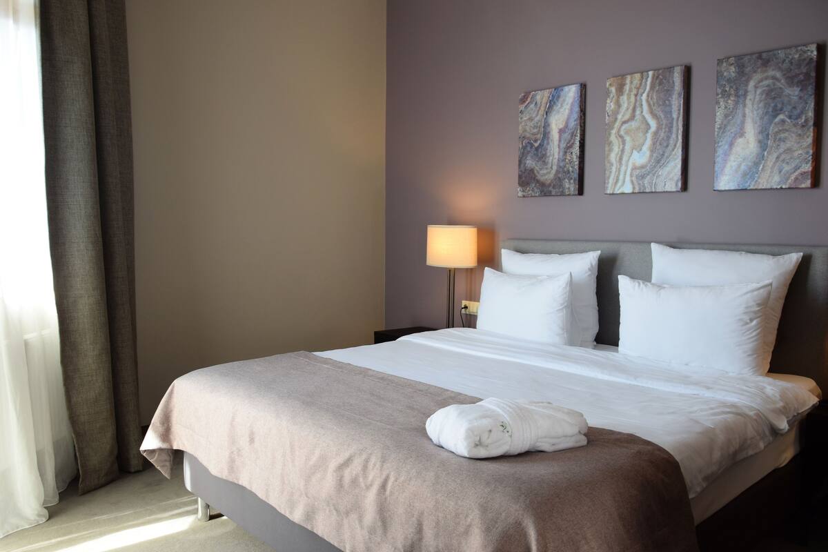 Panoramic Suite, 1 Bedroom, Balcony, Mountain View | In-room safe, desk, iron/ironing board, free WiFi