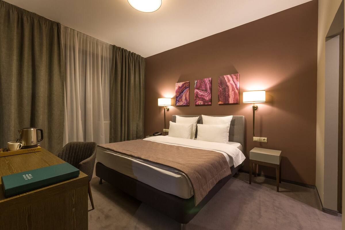 Premier Suite, 1 Bedroom, Balcony | In-room safe, desk, iron/ironing board, free WiFi