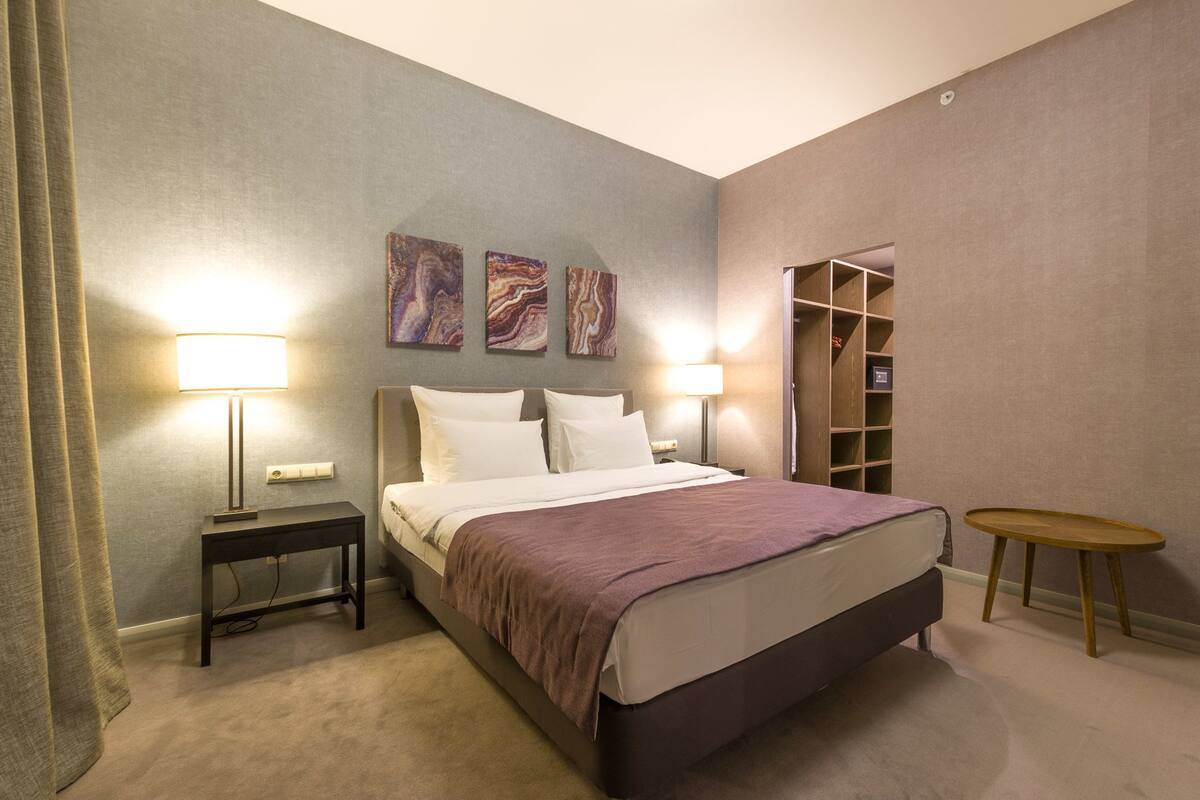 Suite, Balcony (Green Flow) | In-room safe, desk, iron/ironing board, free WiFi