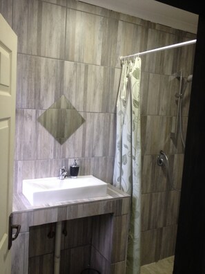 Exclusive Room (2) | Bathroom | Shower, free toiletries, hair dryer, towels - AfricaWisa at O.R.Tambo Airport (Kempton Park)