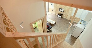 Habitación doble | Zona de estar | Una televisión de pantalla plana