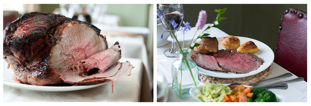 A roasted ham on a plate, a plate with sliced ham and vegetables, and a glass of wine.