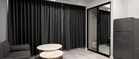 Luxury Room, Non Smoking | Living area | 55-inch Smart TV with cable channels, TV