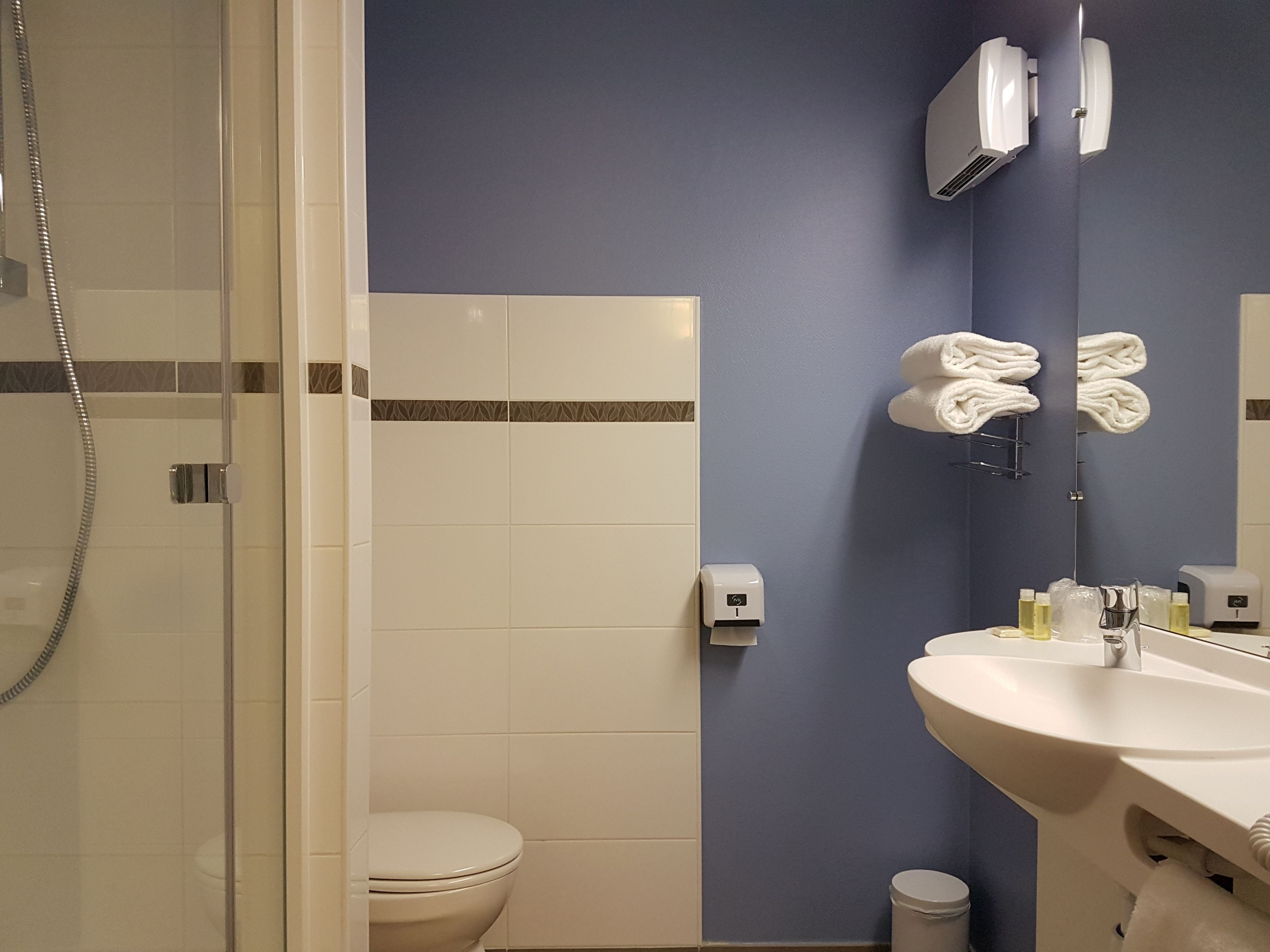 shower, free toiletries, hair dryer, towels