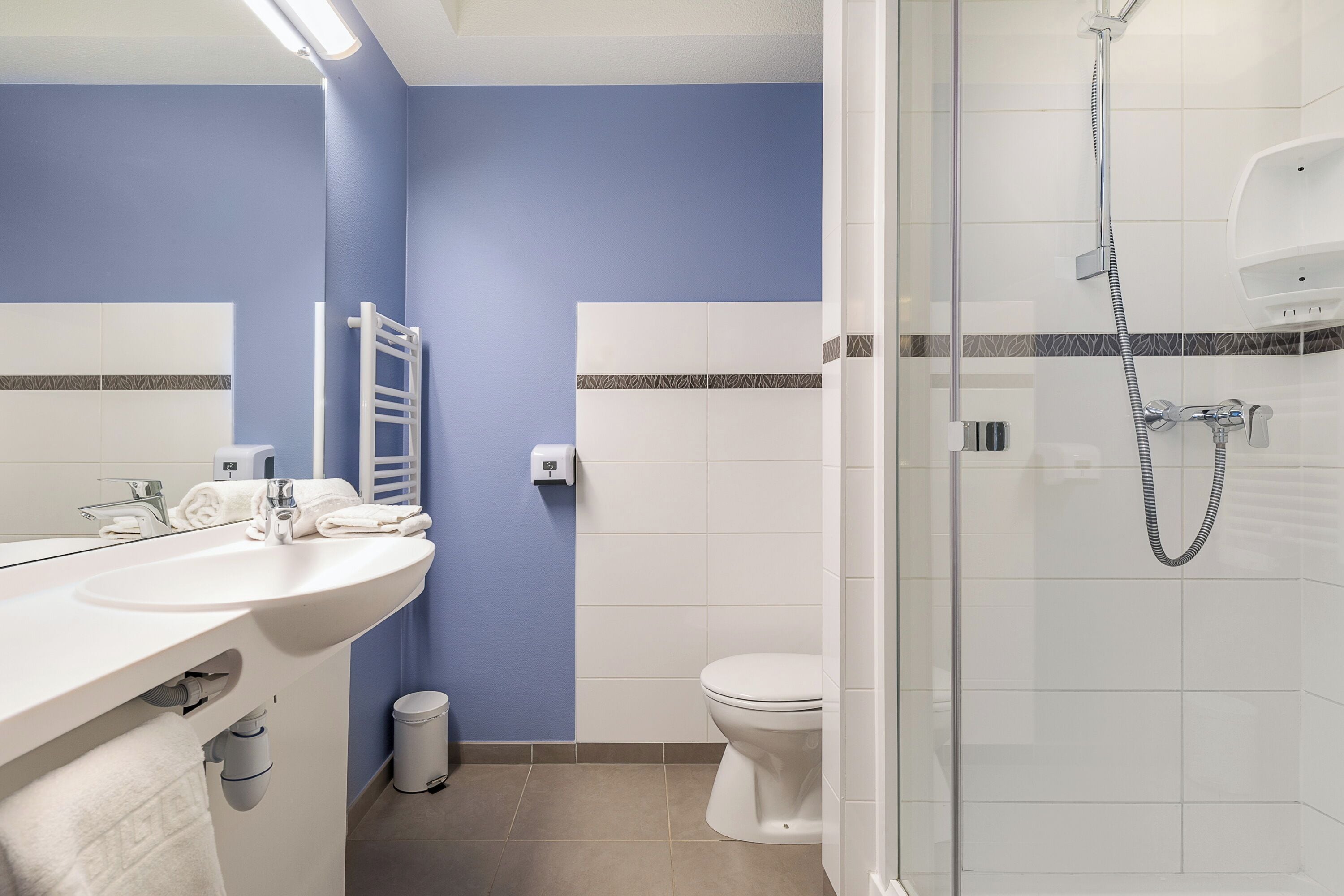 shower, free toiletries, hair dryer, towels