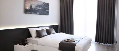 Suíte estúdio luxo, para não fumantes | Ferros/tábuas de passar roupa, Wi-Fi de cortesia, roupa de cama