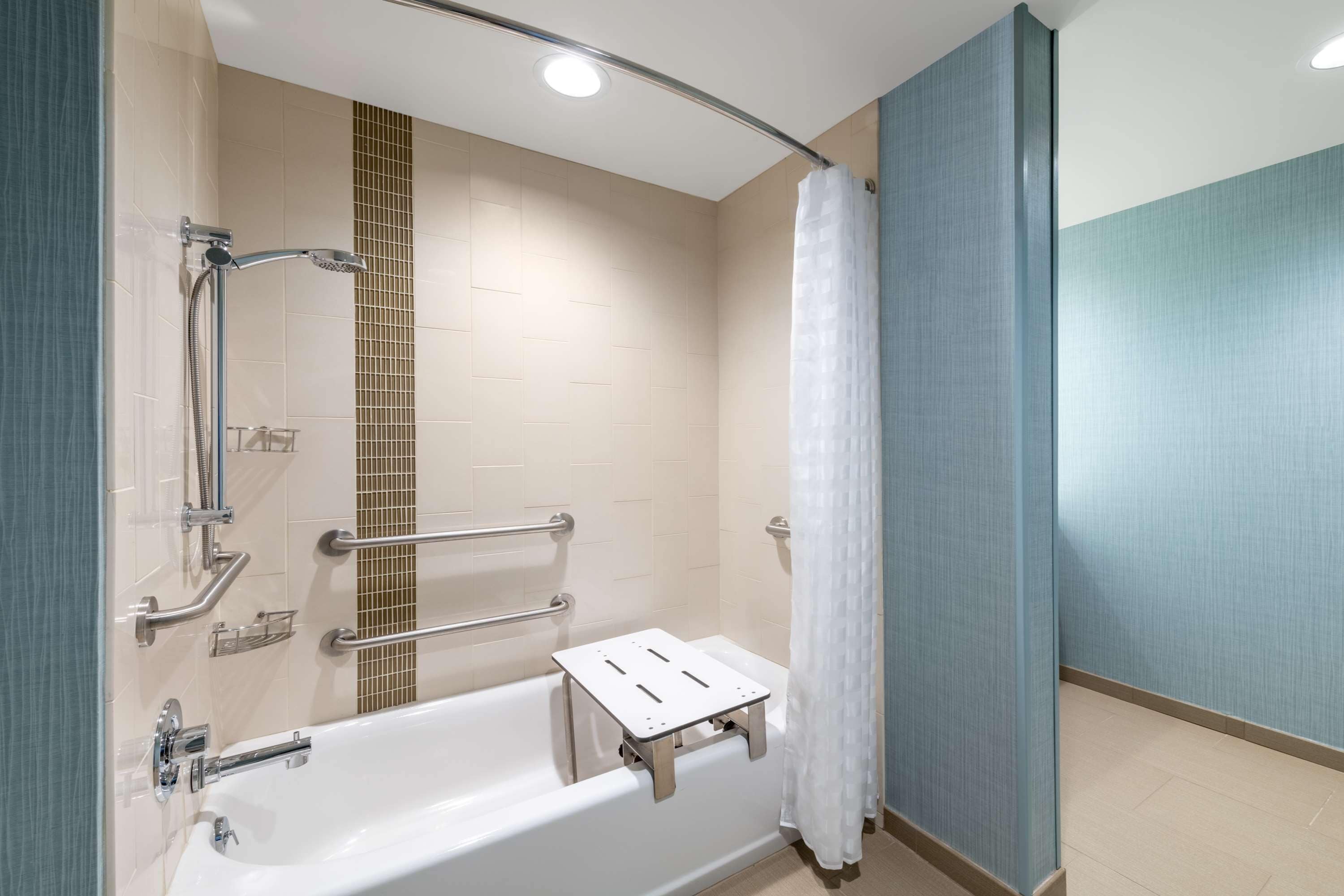 designer toiletries, hair dryer, towels