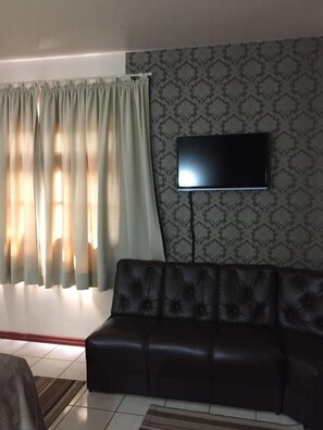 Flat-screen TV - Villa Apart Hotel (Lages)