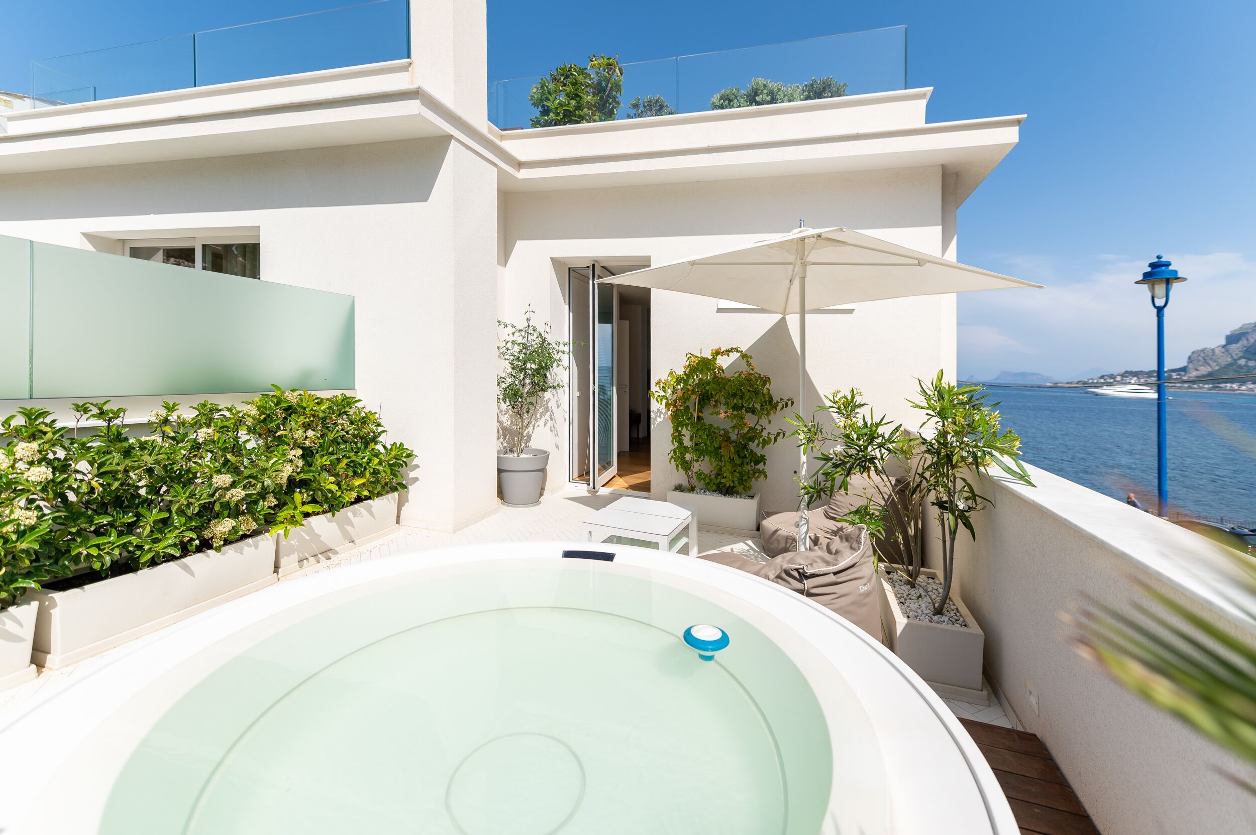 junior studio suite, 1 king bed, hot tub, sea view | premium bedding, down duvets, memory-foam beds, minibar