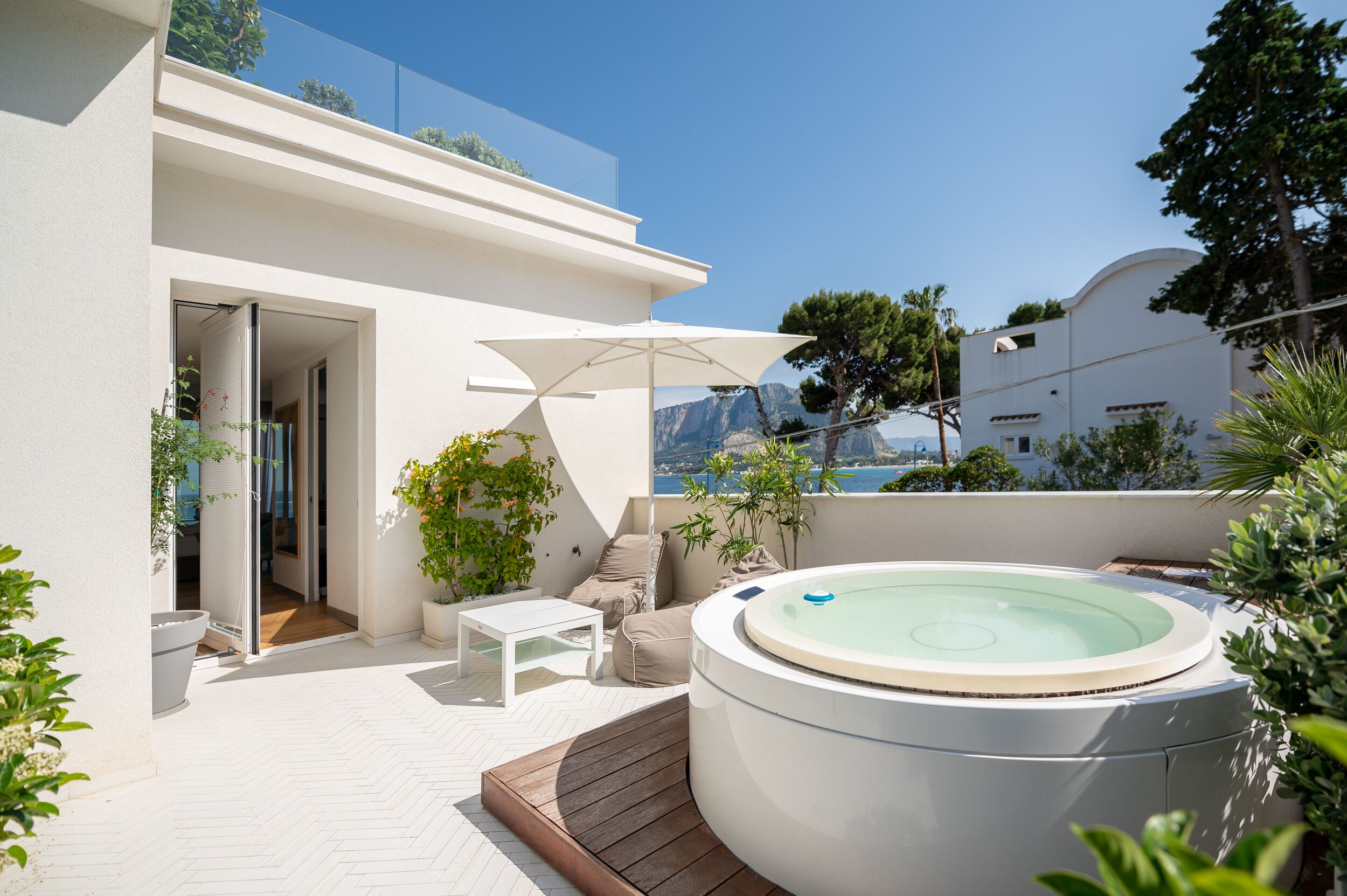 junior studio suite, 1 king bed, hot tub, sea view | premium bedding, down duvets, memory-foam beds, minibar