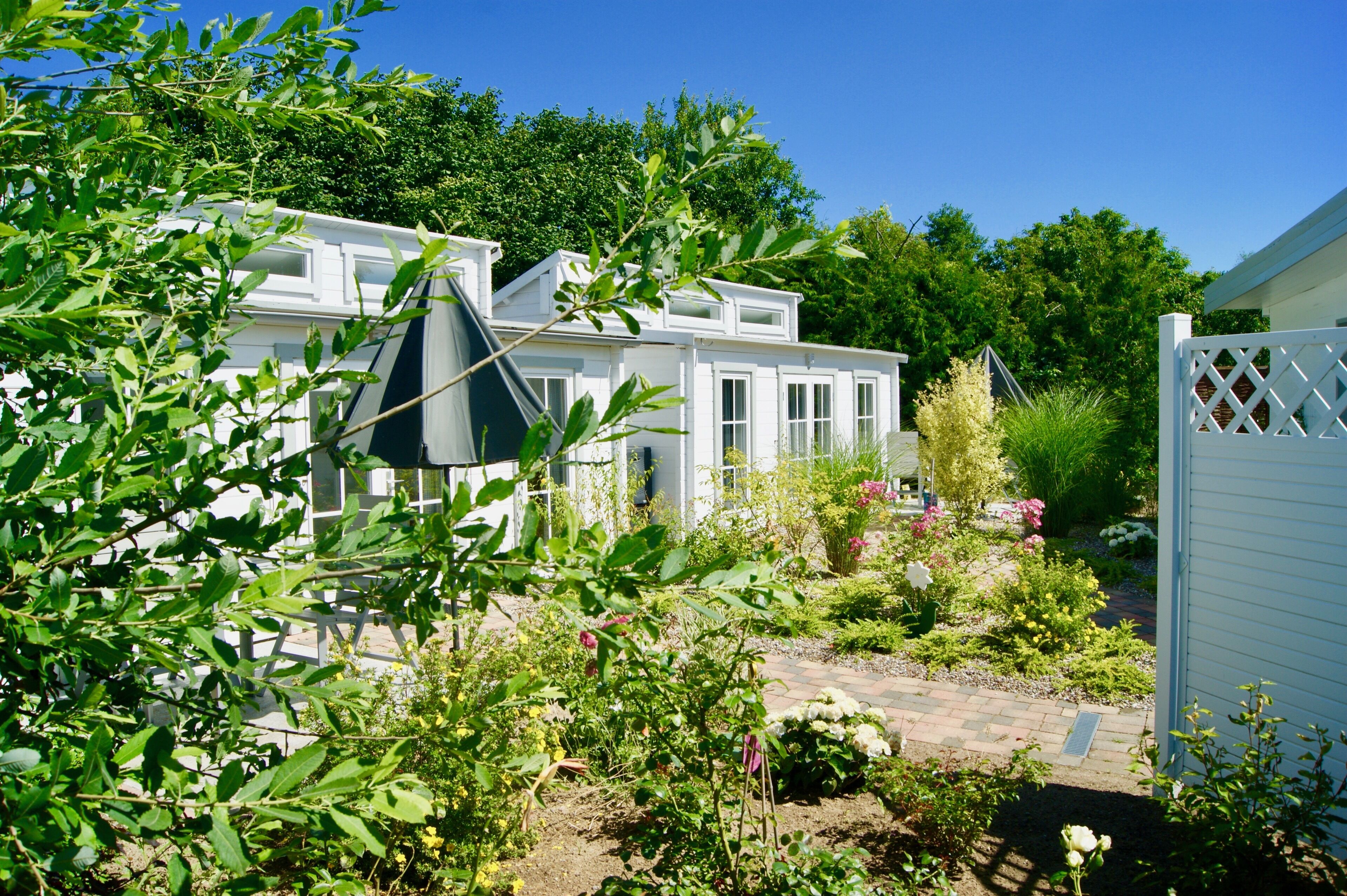 Ferienbungalow Lütt Möw | Zona de estar | Una televisión de pantalla plana
