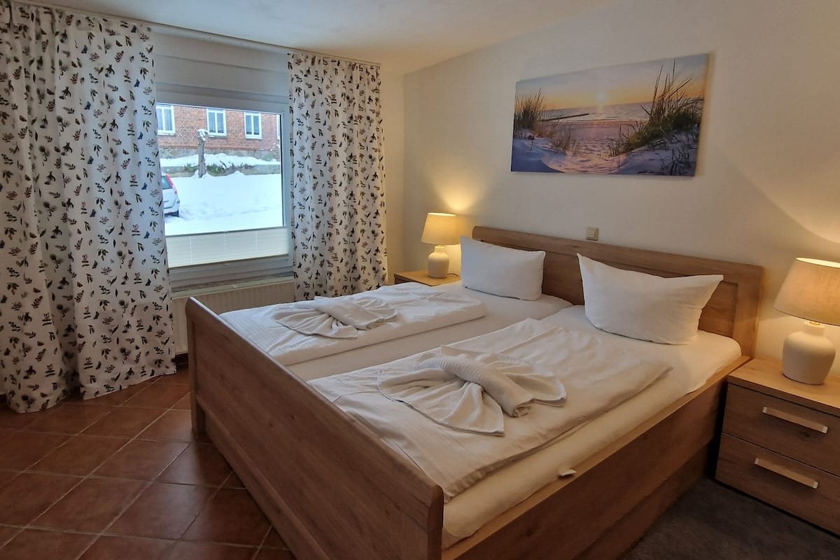 Blackout curtains, iron/ironing board, free WiFi, bed sheets