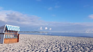 On the beach, beach yoga, beach volleyball
