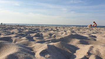 On the beach, beach yoga, beach volleyball