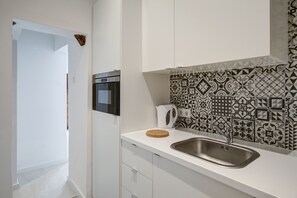 Departamento, 1 habitación, cocina | Cocina privada | Refrigerador con congelador, microondas y parrilla de estufa