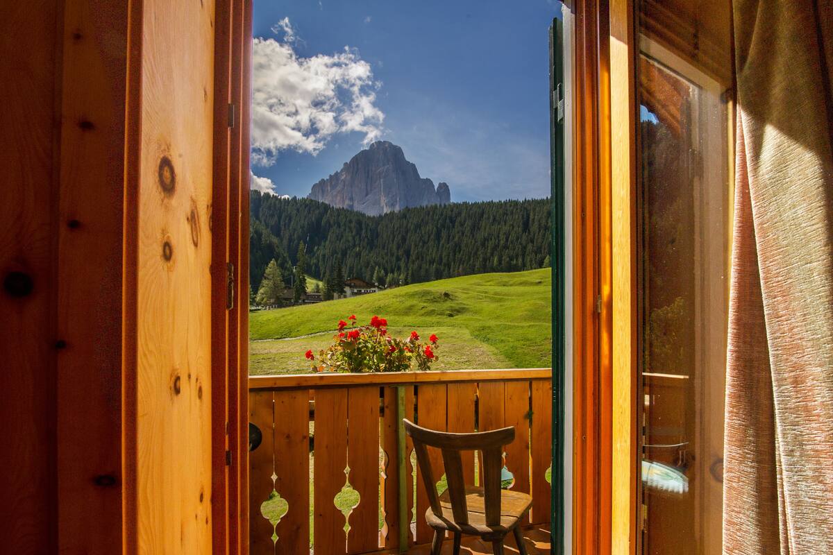 Panoramic Quadruple Room, Balcony, Mountain View | In-room safe, desk, iron/ironing board (on request), bed sheets