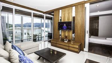 Standard Apartment, 2 Bedrooms, Non Smoking | Living area | Flat-screen TV