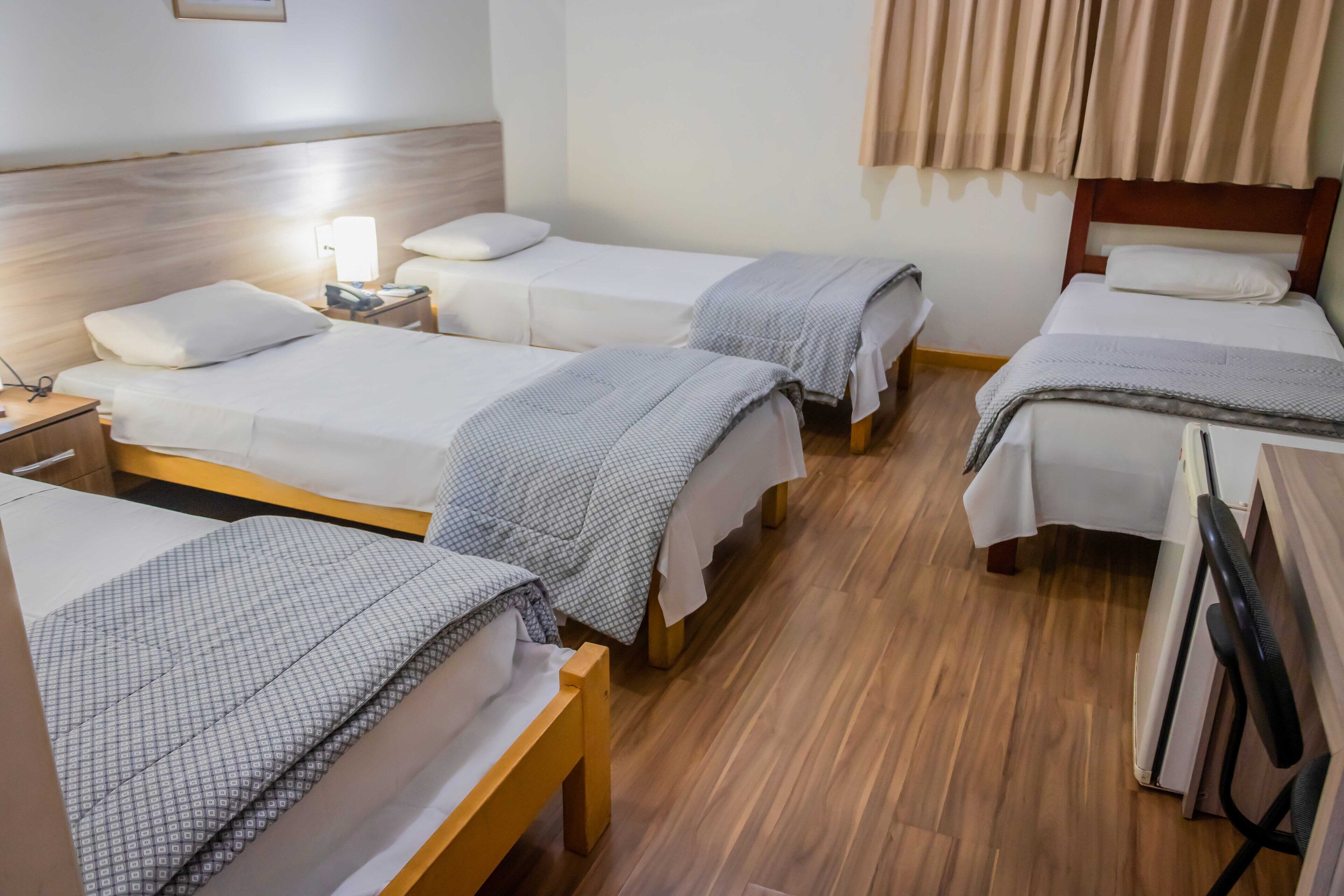 quadruple room, multiple beds, non smoking | minibar, desk, blackout curtains, free wifi