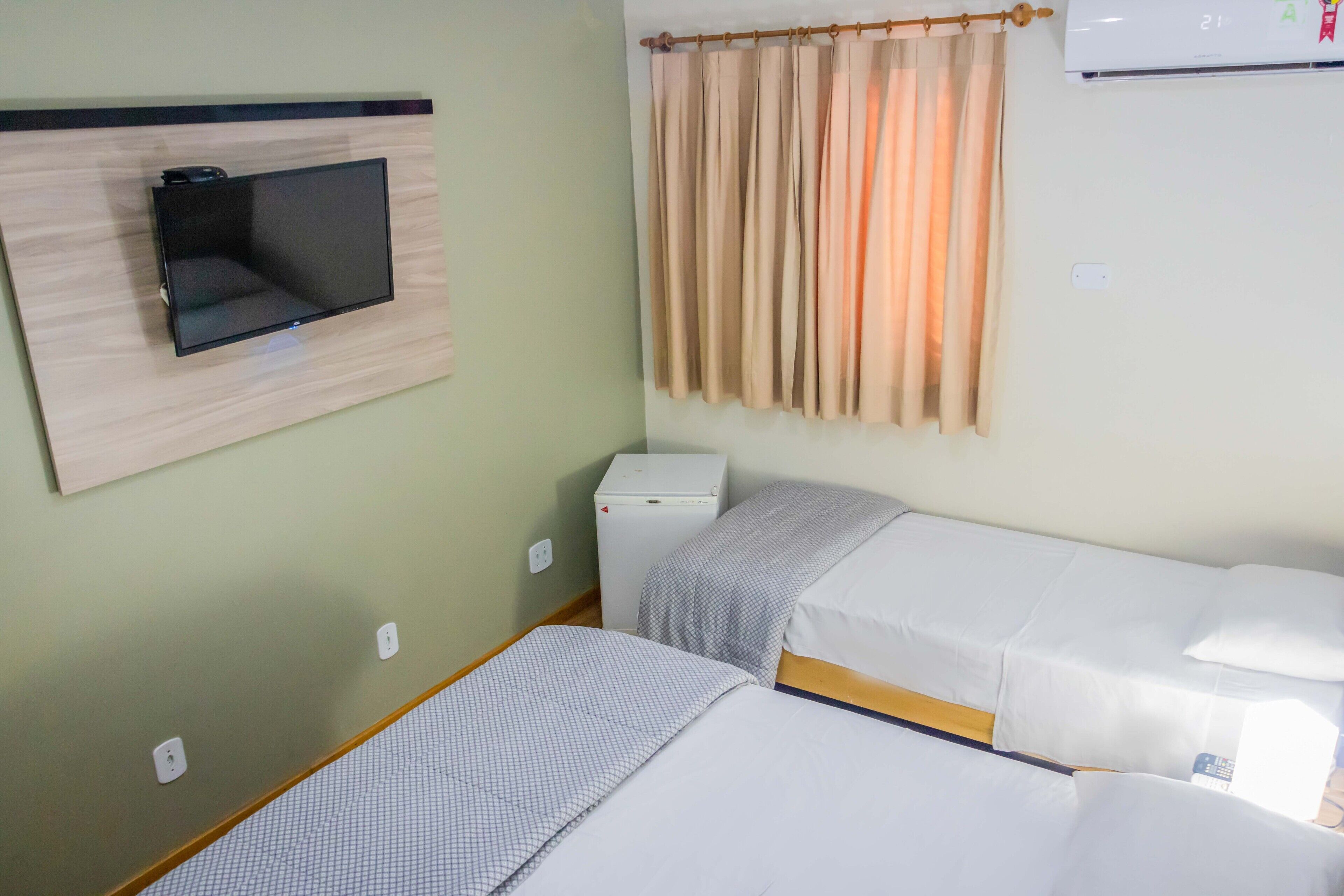 family room | minibar, desk, blackout curtains, free wifi