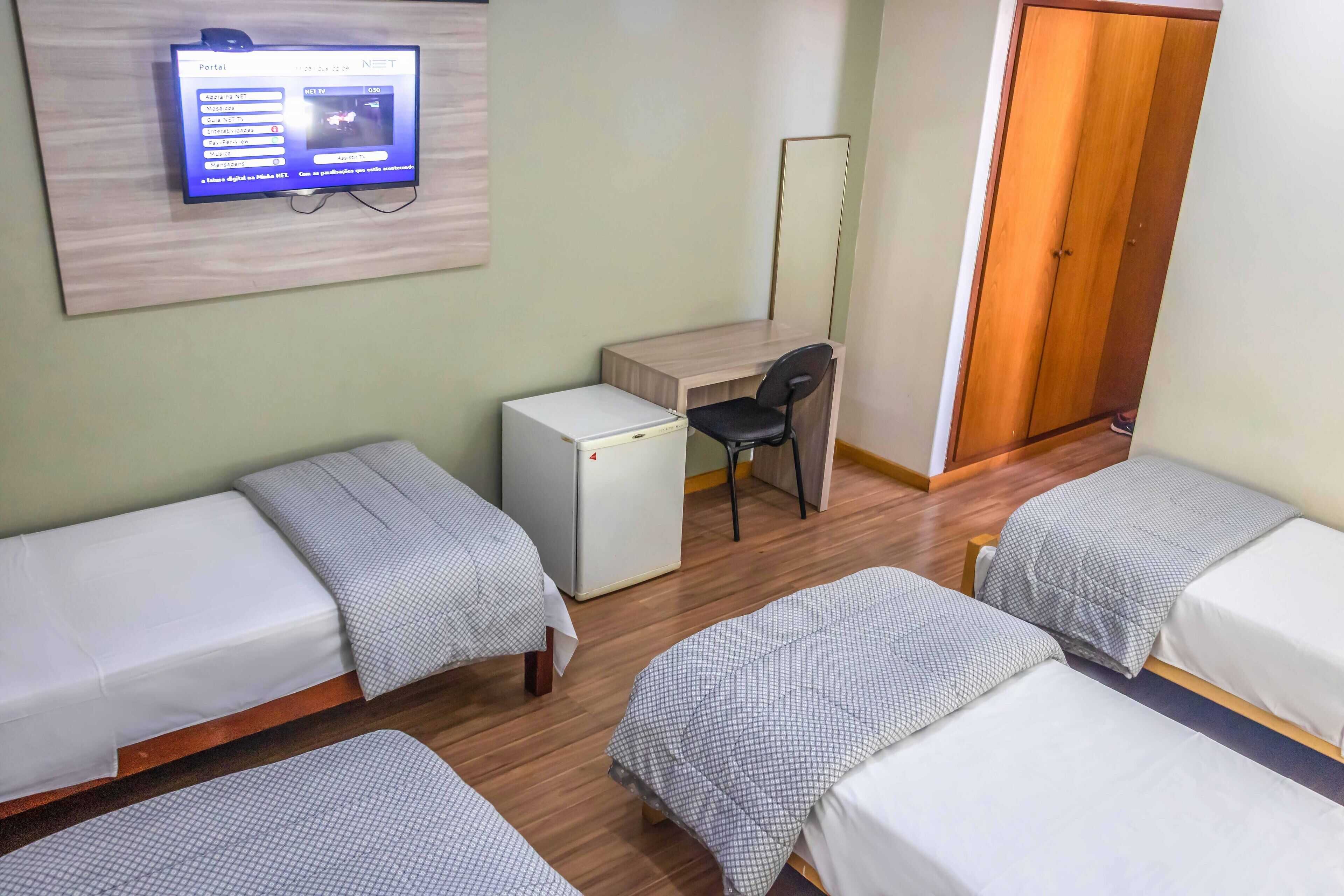 quadruple room, multiple beds, non smoking | minibar, desk, blackout curtains, free wifi