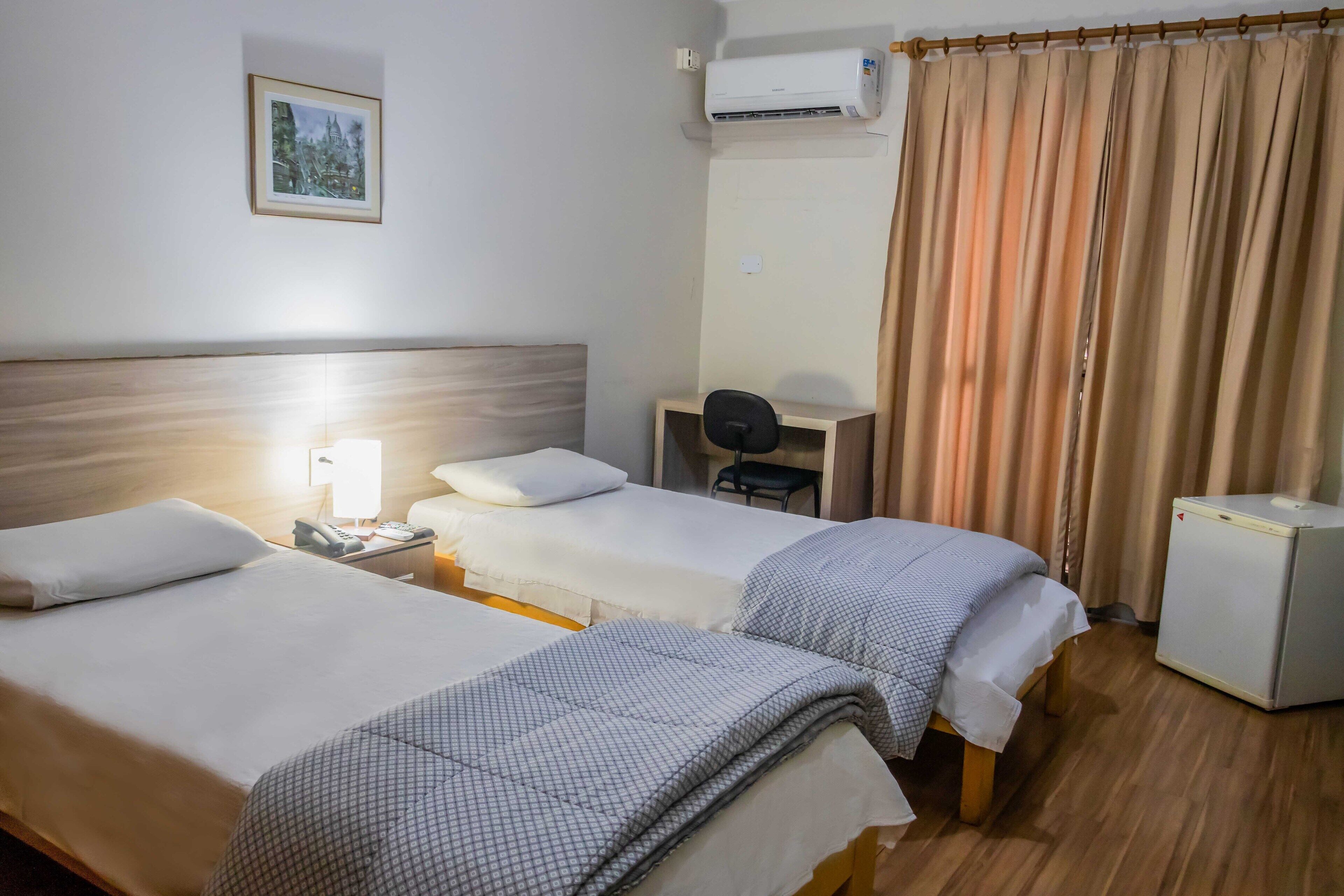 twin room, 2 single beds, non smoking | minibar, desk, blackout curtains, free wifi