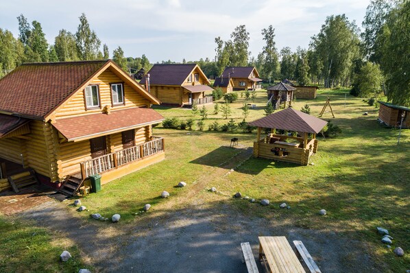 Family Cottage, 4 Bedrooms, Kitchen, Lake View | Iron/ironing board, rollaway beds, free WiFi, bed sheets