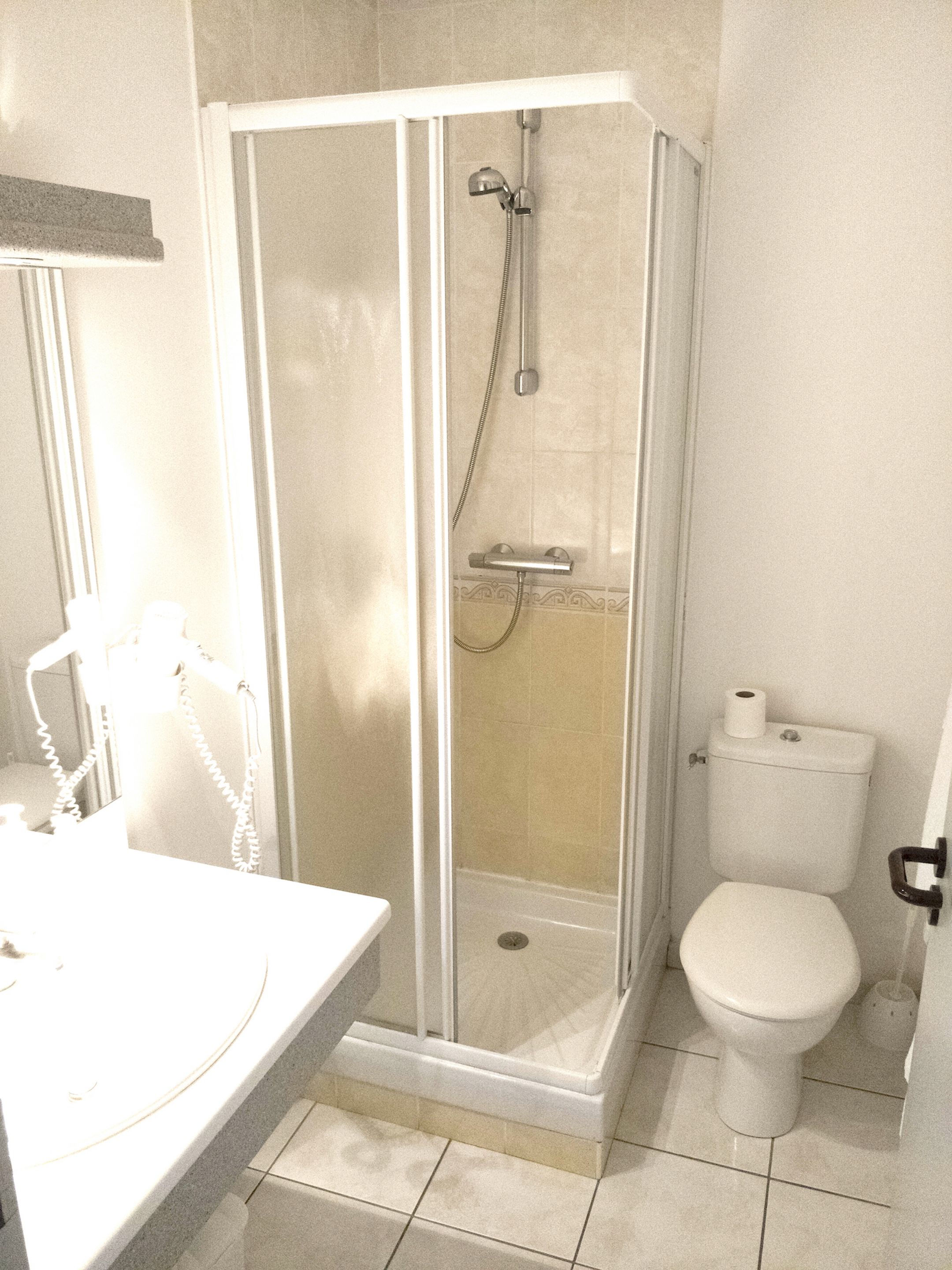 standard quadruple room | bathroom | shower, free toiletries, hair dryer, towels
