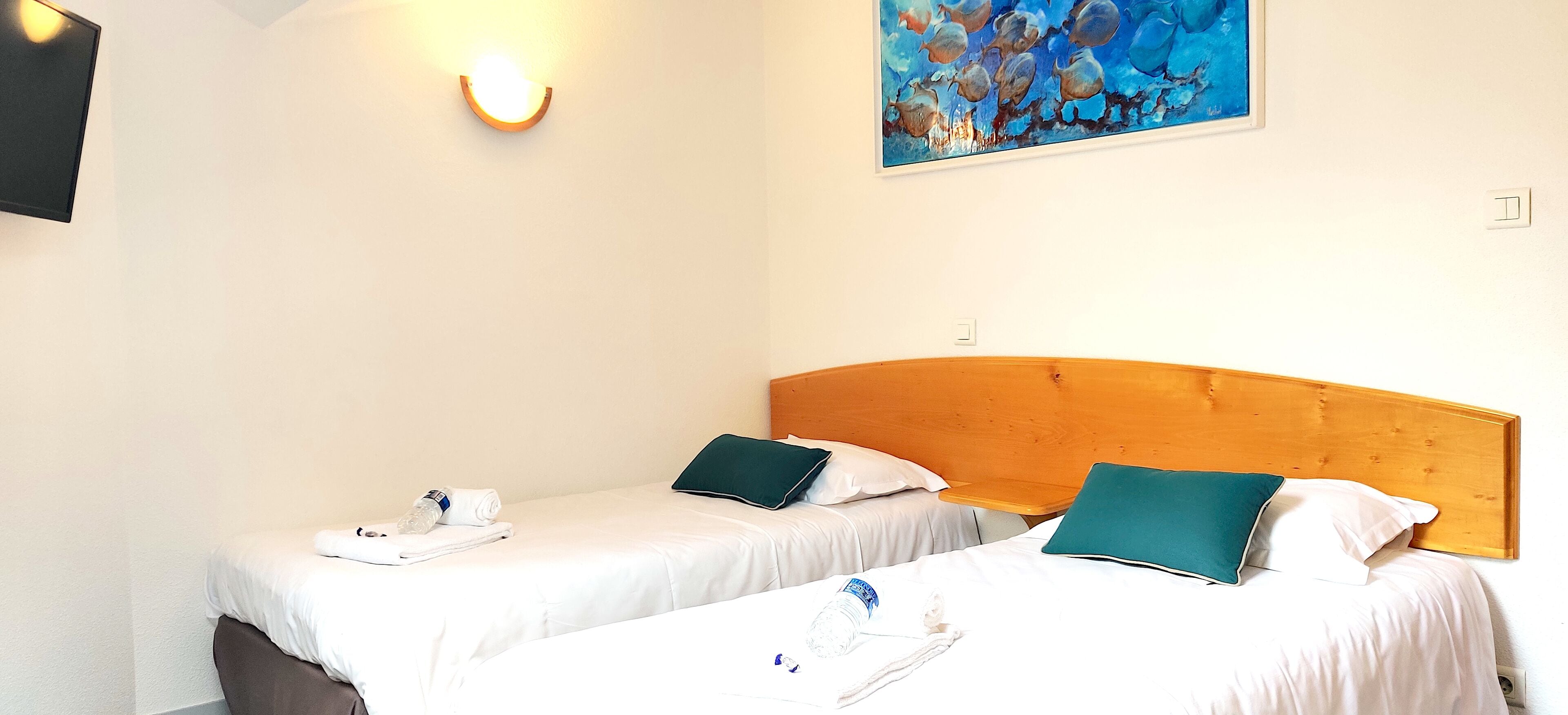 standard quadruple room | individually decorated, individually furnished, desk, blackout curtains