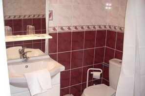 Shower, free toiletries, hair dryer, towels
