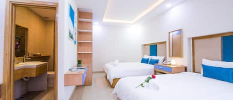 Family Studio Suite, Multiple Beds, City View | Minibar, individually furnished, desk, laptop workspace