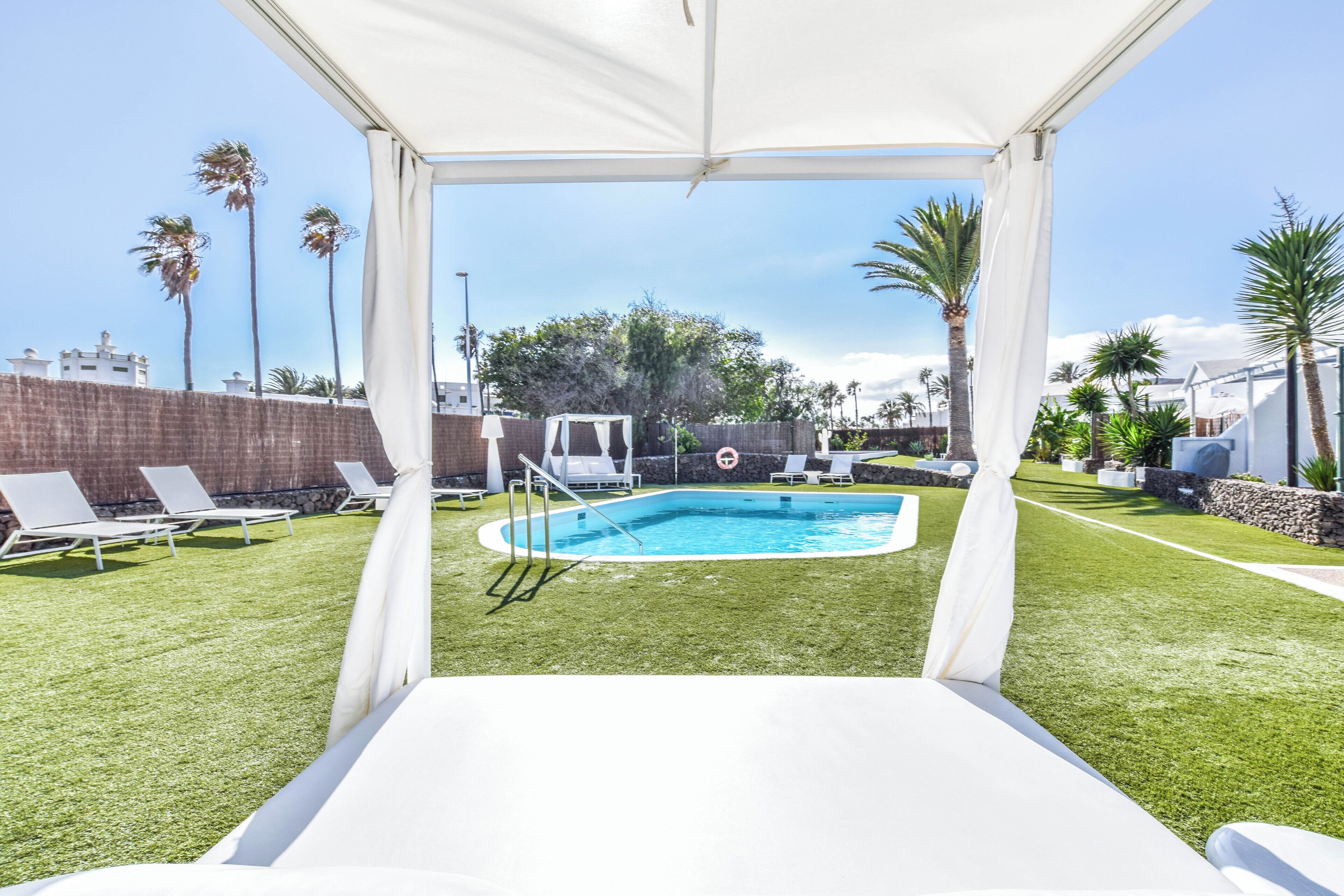 Outdoor pool, pool umbrellas, pool loungers