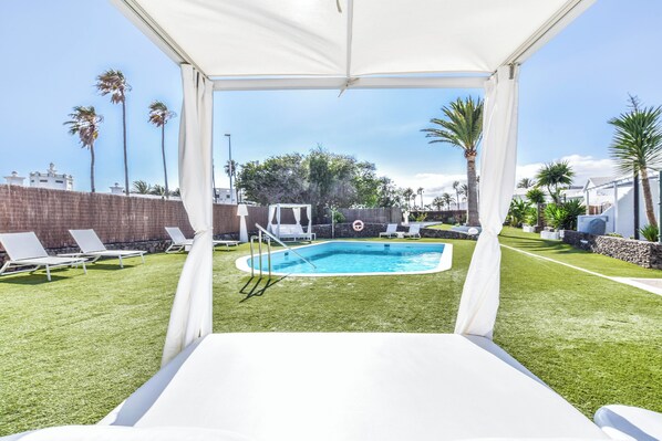 Outdoor pool, pool umbrellas, pool loungers