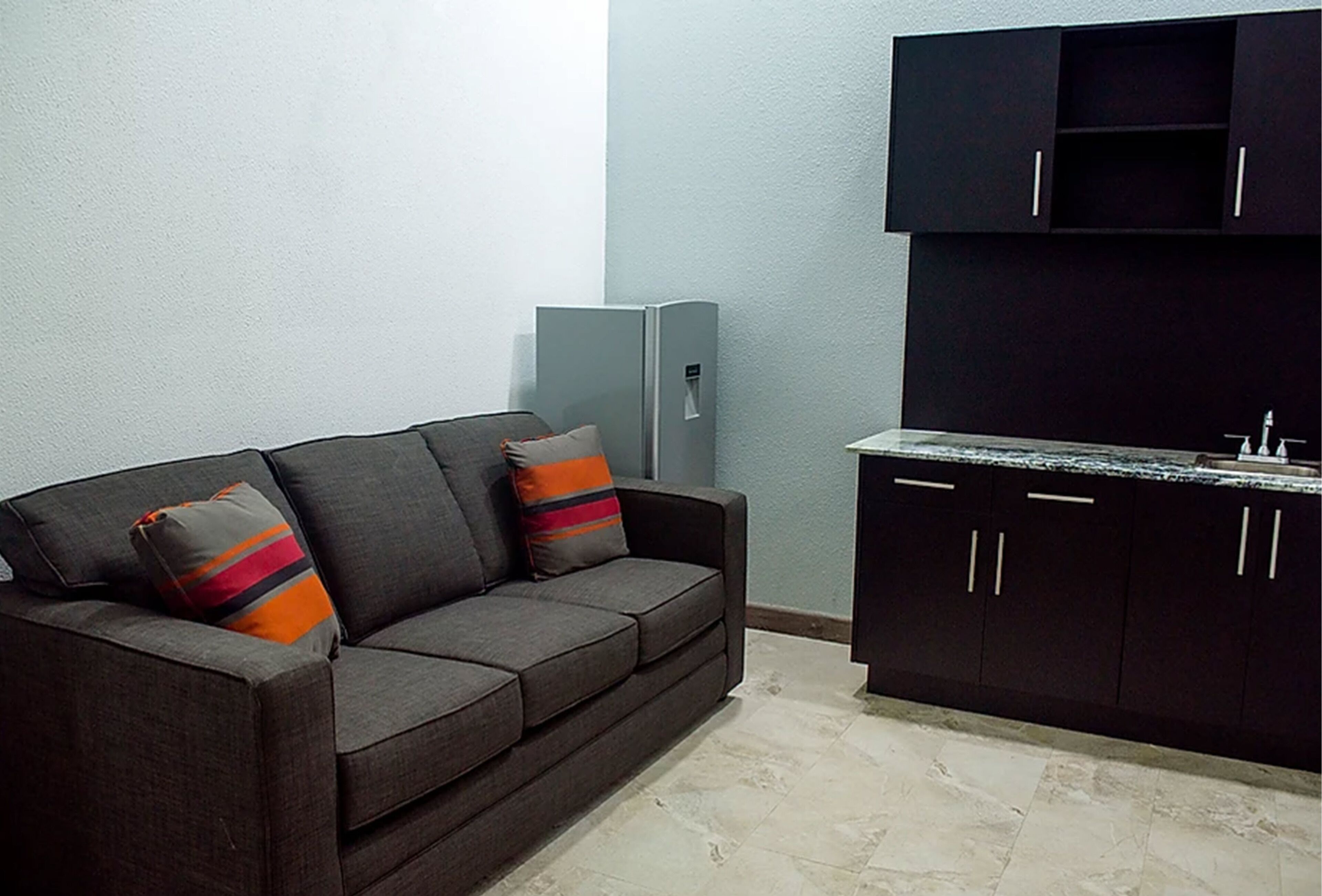 minibar, desk, blackout curtains, iron/ironing board