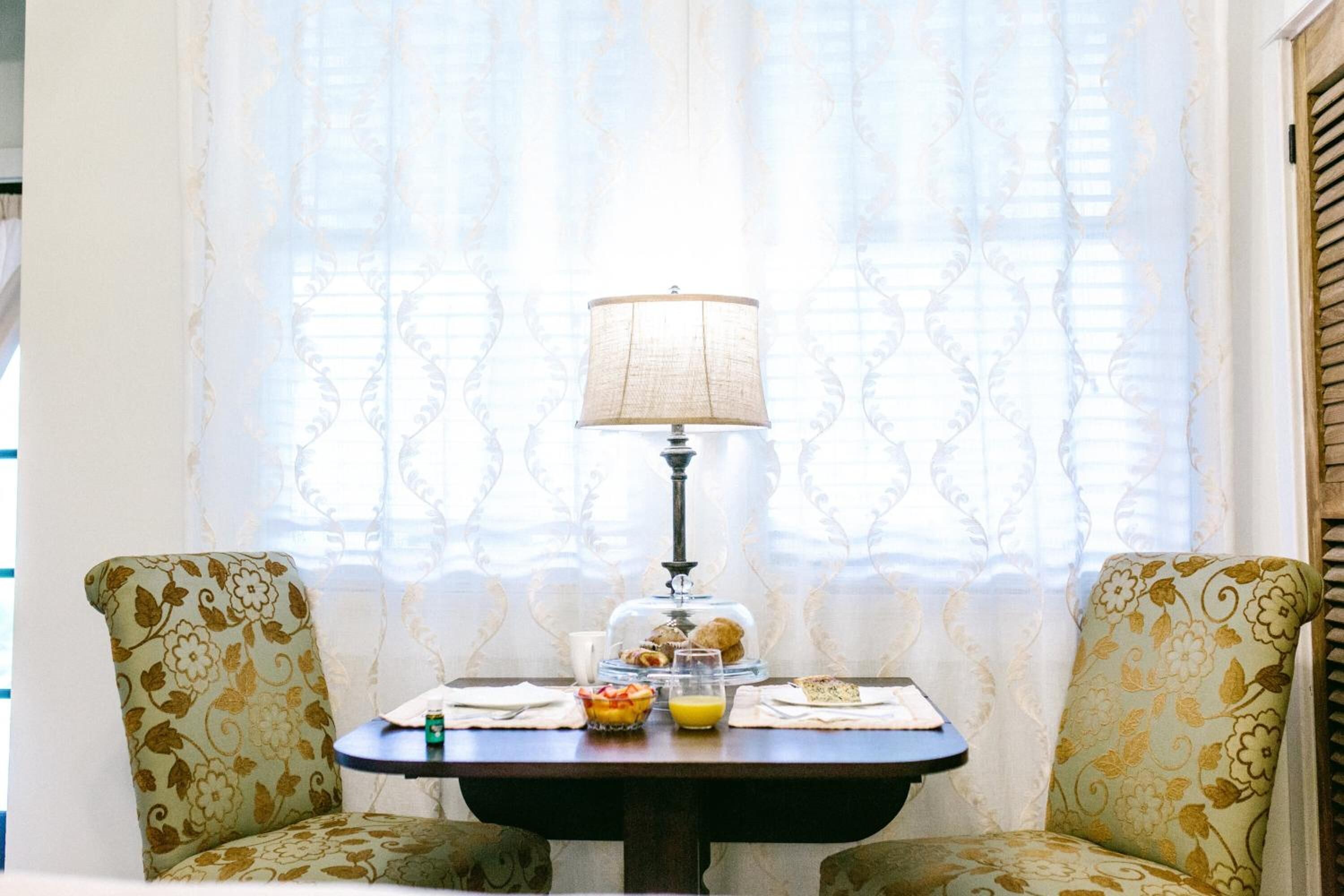 Fridge, microwave, coffee/tea maker, cookware/dishes/utensils