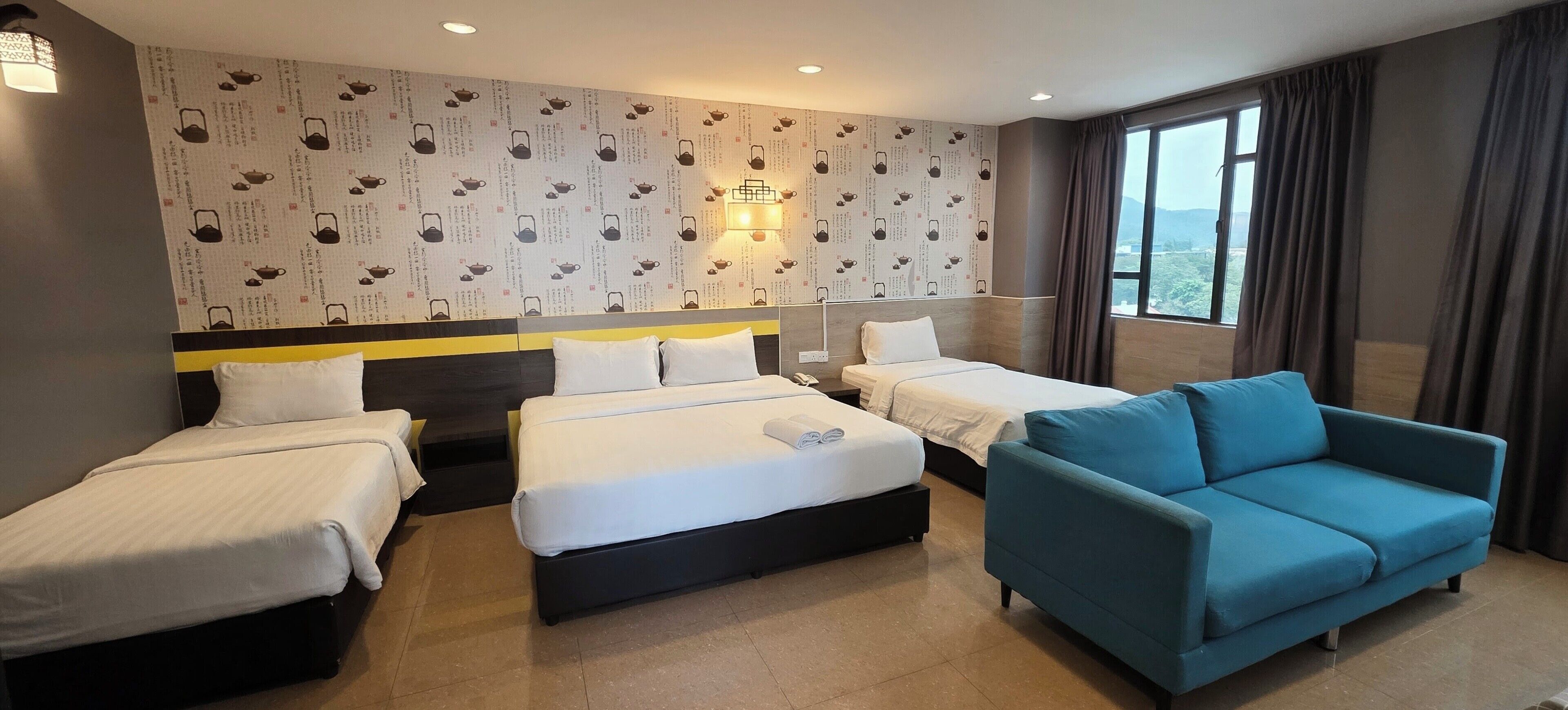 Family Suite | Desk, iron/ironing board (on request), WiFi (free), bed sheets