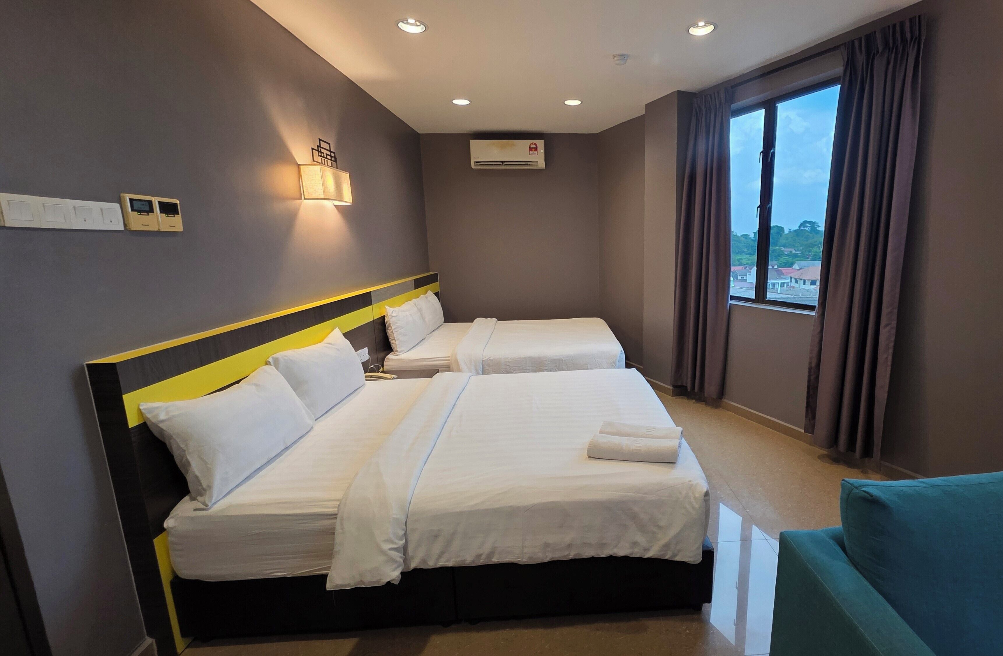 Suite (Double Queen) | Desk, iron/ironing board (on request), WiFi (free), bed sheets