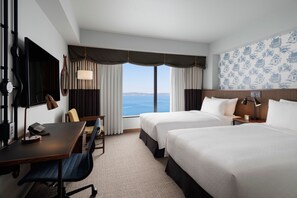 Habitación, 2 camas individuales, vista al océano | 1 habitación, ropa de cama de alta calidad y edredón