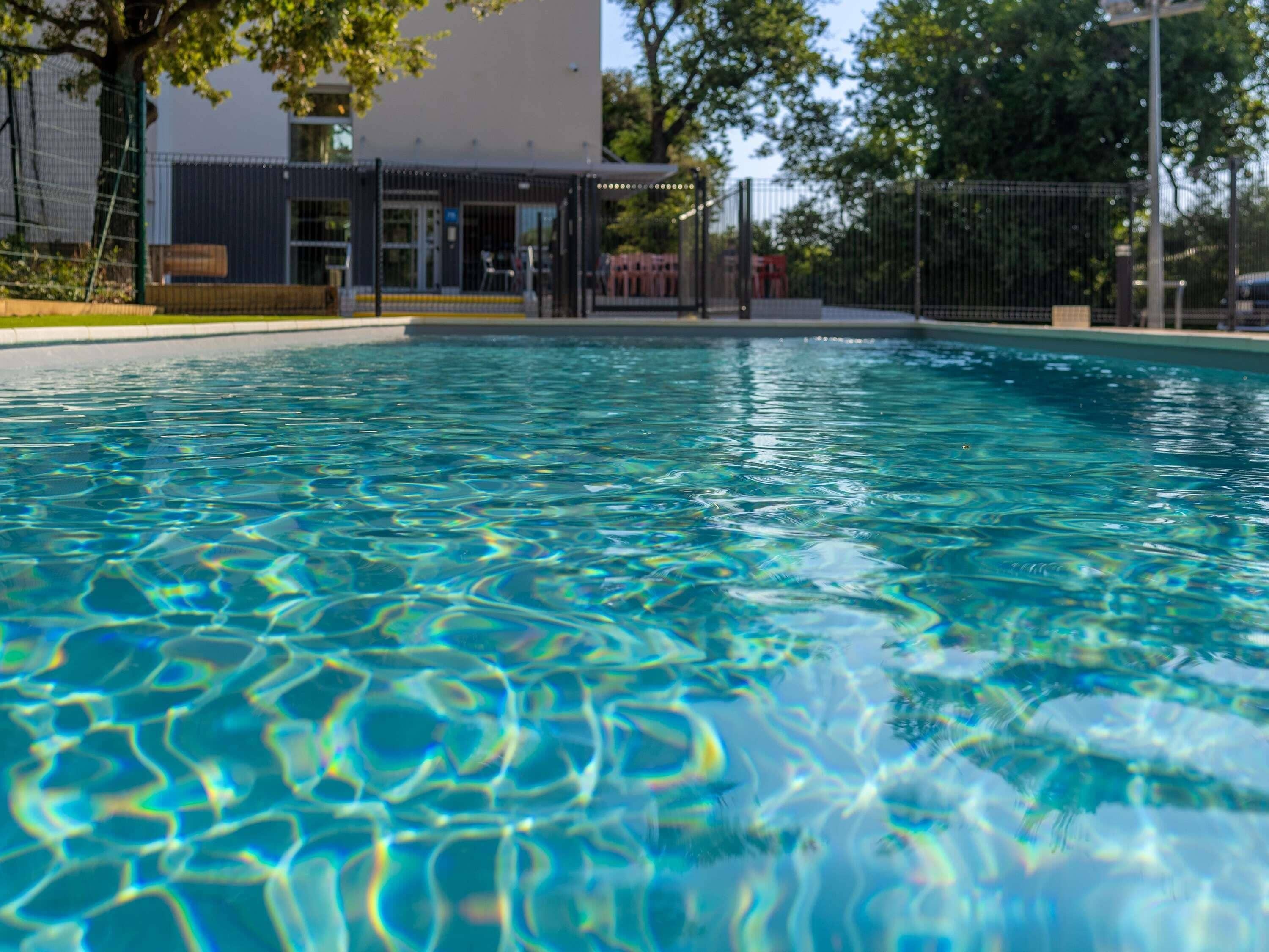 Seasonal outdoor pool, open 9:00 AM to 8:00 PM, pool loungers